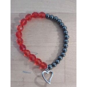 The "Crimson Pulse" Stretch Bracelet – Faceted Red Glass & Gunmetal Hematite